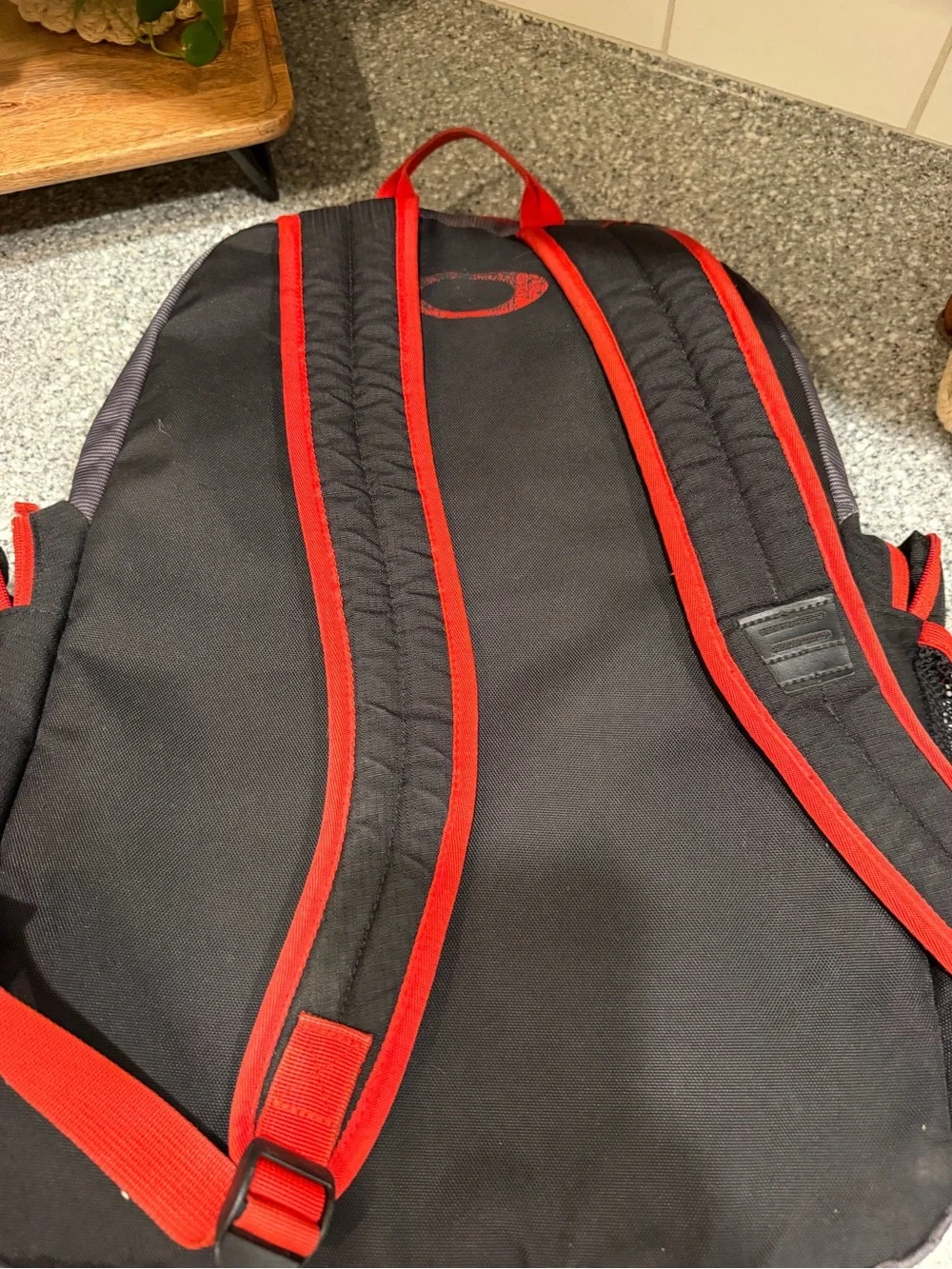 Oakley Black and Red Backpack with Multiple Pockets